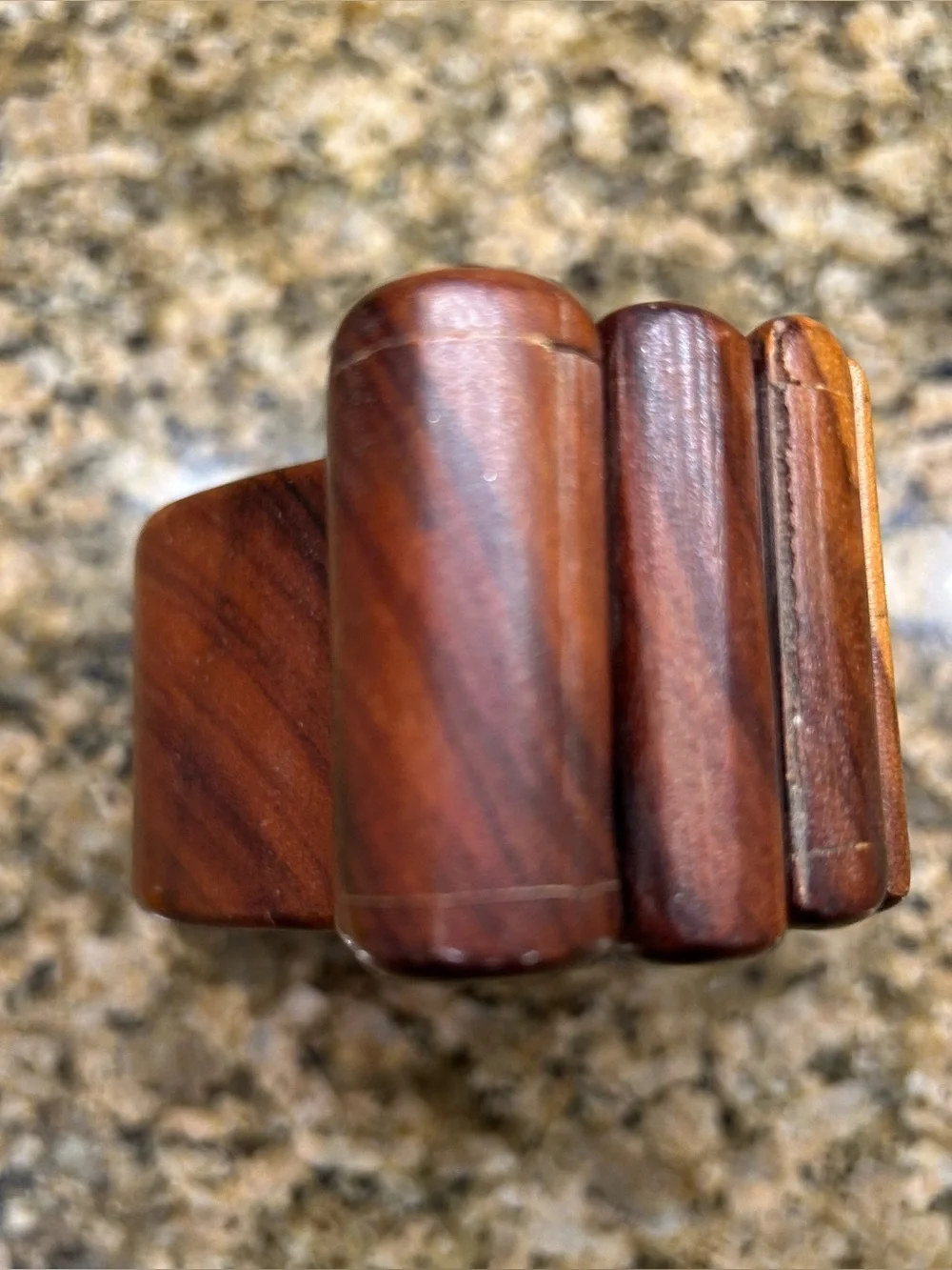 Wooden bandsaw puzzle box with two felt lined secret compartments that slide out